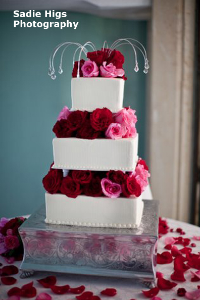 wedding cakes with red flowers